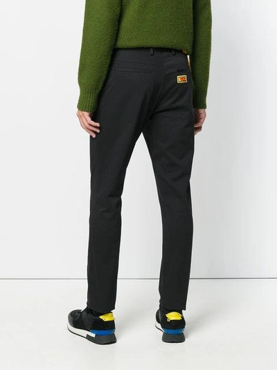 Shop Fendi Applique Patch Detail Trousers