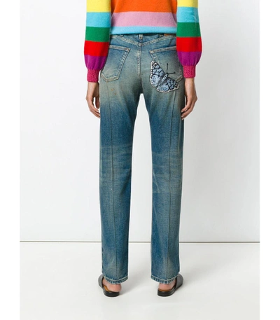 Shop Gucci Blue Embroidered Faded Jeans