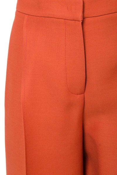 Shop Fendi Cropped Tailored Wool-silk Blend Trousers In Orange