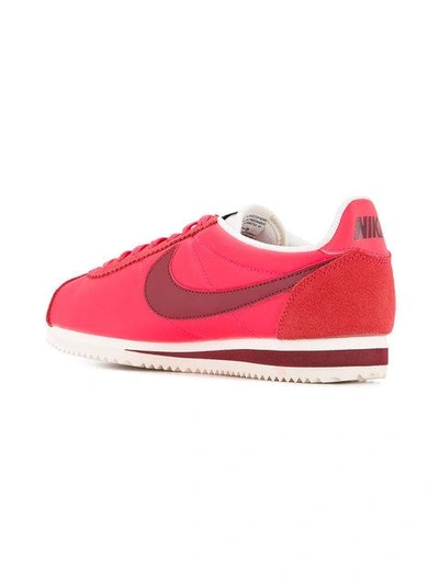 Shop Nike Cortez Sneakers In Red