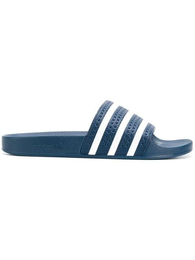 Shop Adidas Originals Adilette Slides In Blue