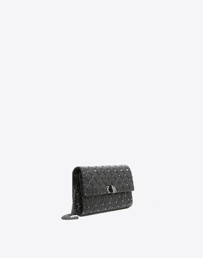 Shop Valentino Garavani Crinkled Lambskin Rockstud Spike Crossbody Clutch In Black