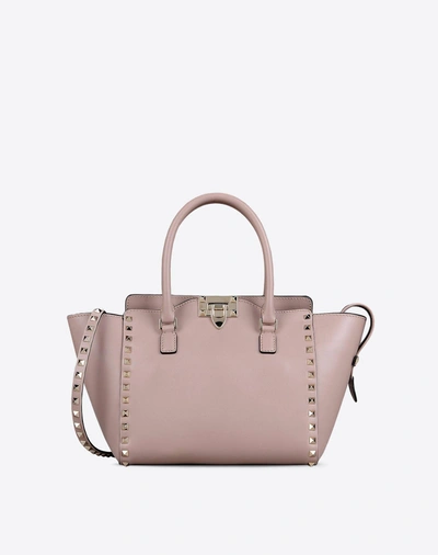 Shop Valentino Small Rockstud Top-handle Bag In Poudre