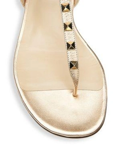 Shop Valentino Rockstud Leather Thong Sandals In Copper
