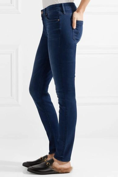 Shop Mother Looker Mid-rise Skinny Jeans In Dark Denim
