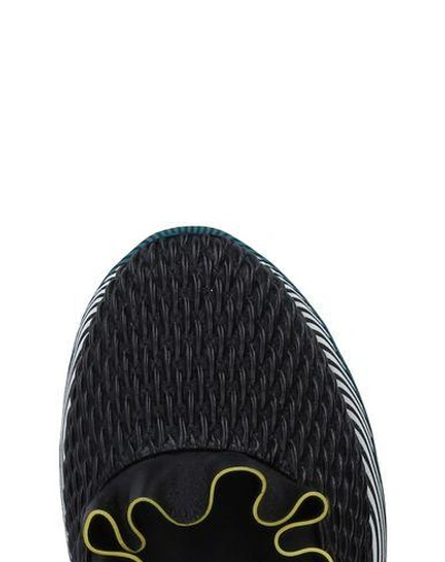 Shop Fendi Sneakers In Black