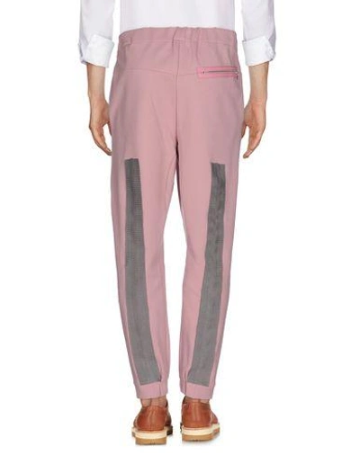 Shop Oamc Casual Pants In Pink
