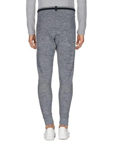 Shop Nike Casual Pants In Grey