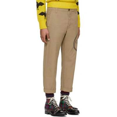 Shop Gucci Beige Ouroboros Logo Chinos In 9821 Saturn/black