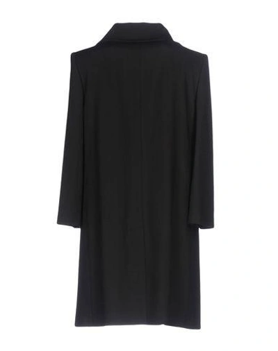 Shop Dolce & Gabbana Coat In Black