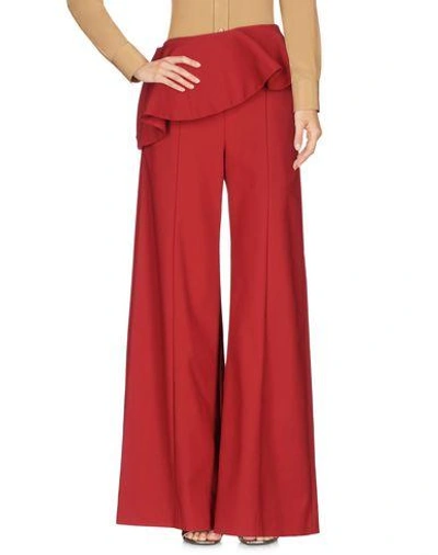 Shop Rosie Assoulin Pants In Brick Red