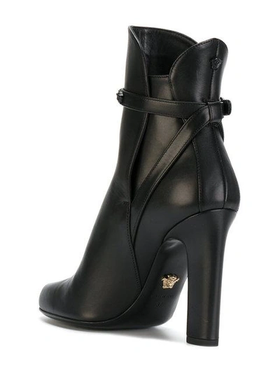 Shop Versace Medusa Buckle Ankle Boots In Black