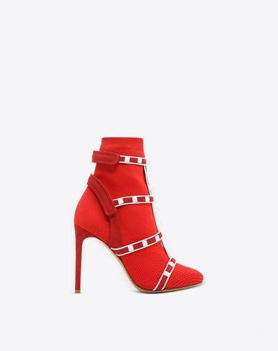 Shop Valentino Rockstud Ankle Boot In  Red
