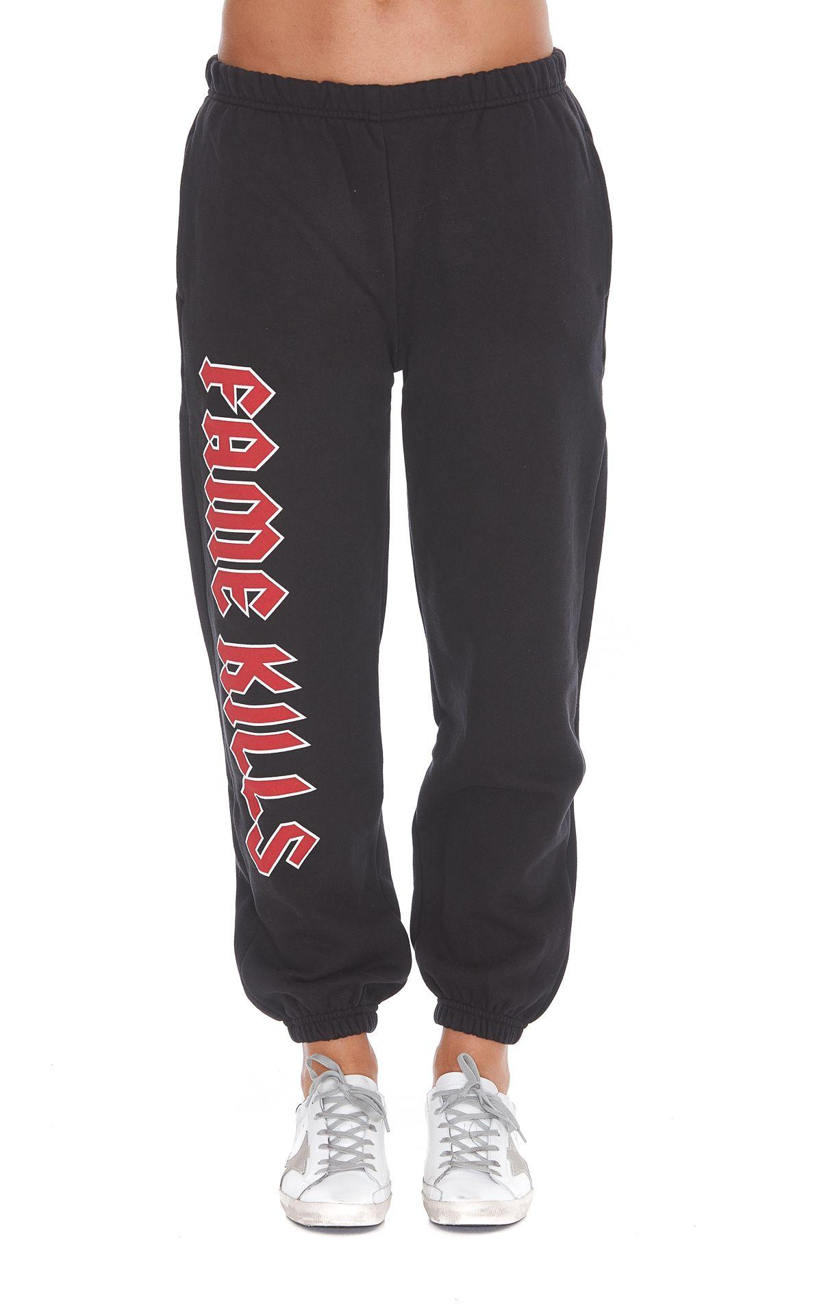 black sweatpants with red stripe