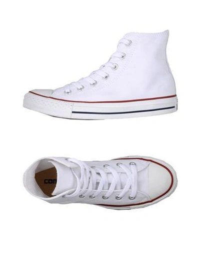 Shop Converse Sneakers In White