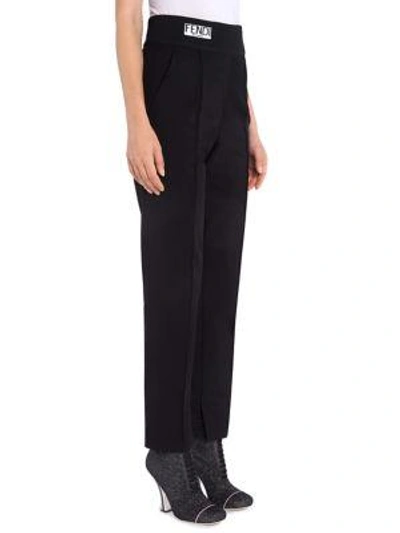 Shop Fendi Logo Waist Pants In Black
