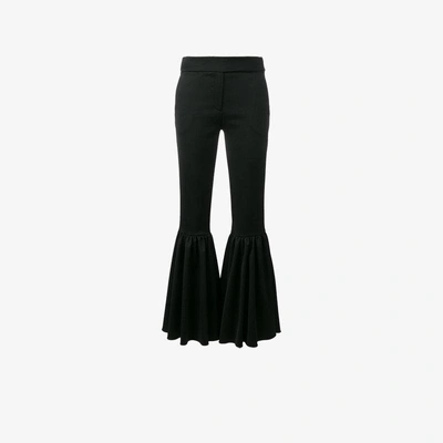 Shop Osman Ariel Flared Stretch Wool Blend Trousers In Black