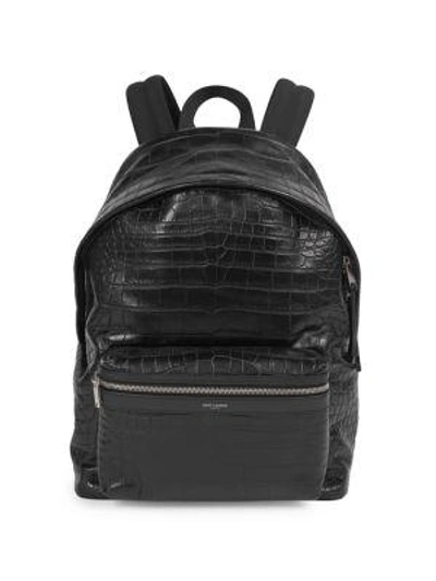 Shop Saint Laurent Embossed Leather Backpack In Black