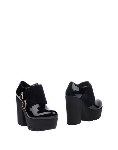 Shop Tipe E Tacchi Booties In Black