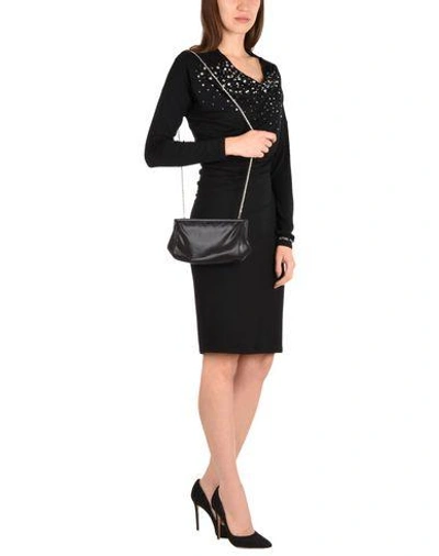 Shop Nina Cross-body Bags In Black