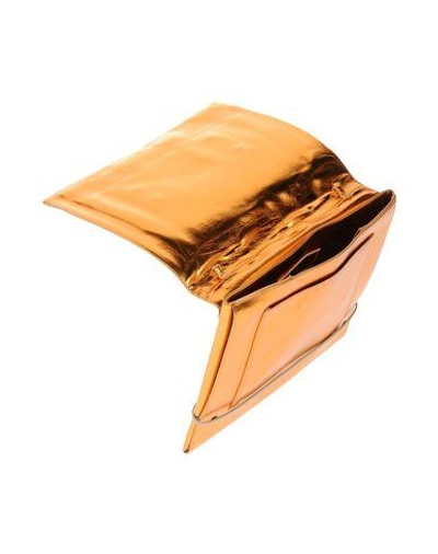 Shop Leo Handbag In Copper