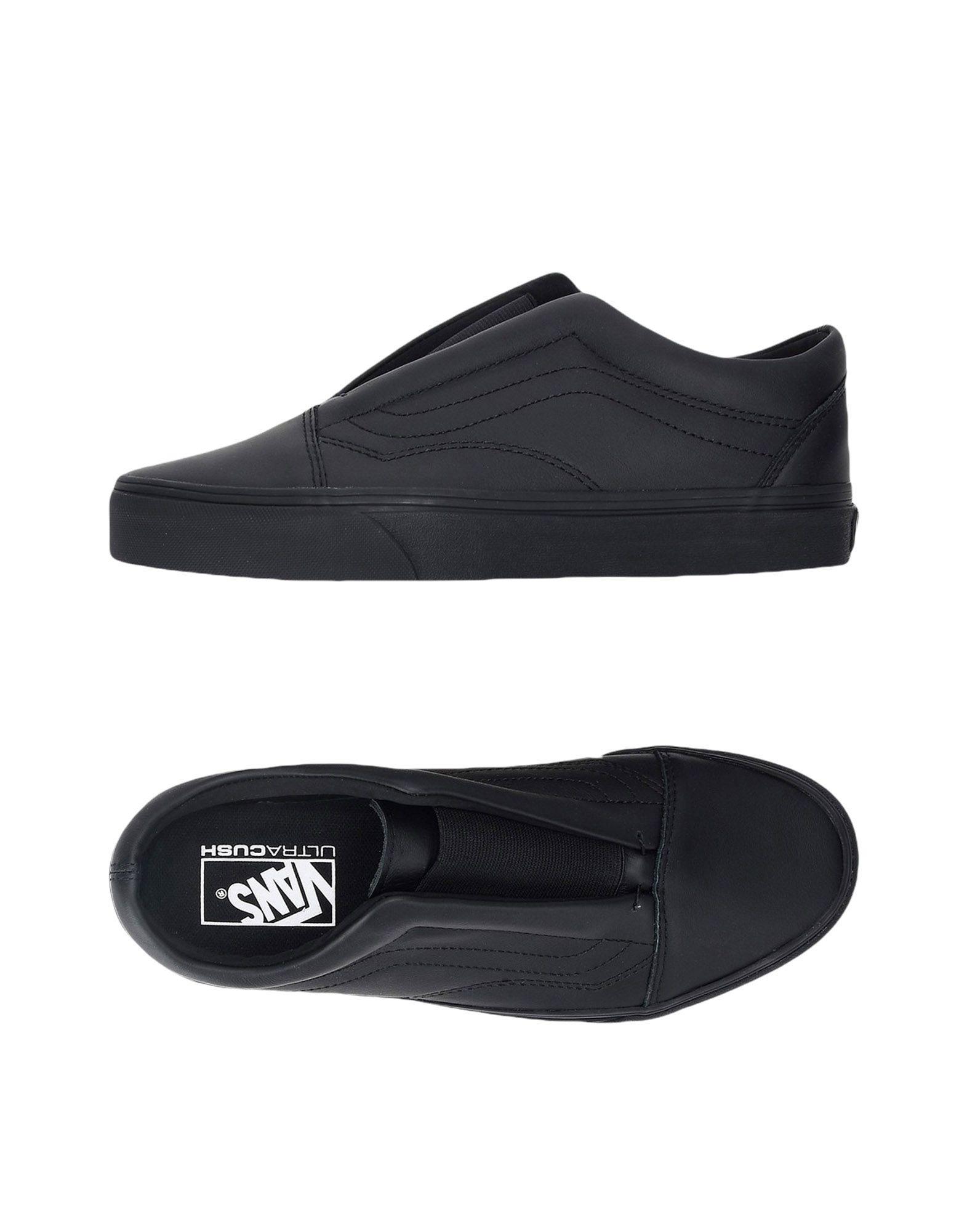 solid black slip on vans