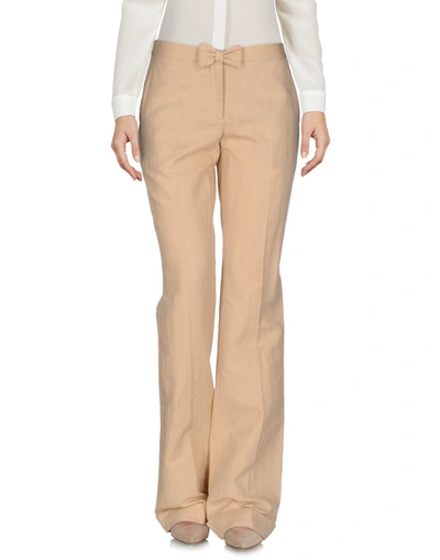 Shop Moschino Cheap And Chic Casual Pants In Sand
