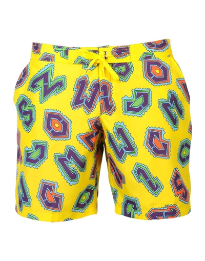 Shop Moschino Swim Swim Trunks In Yellow