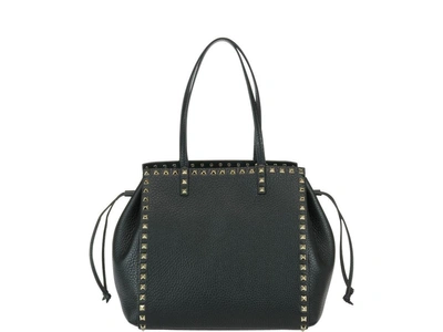 Shop Valentino Rockstud Hand Bag In Black