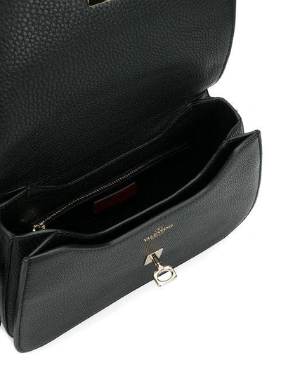 Shop Valentino Garavani Joylock Messenger Bag - Black