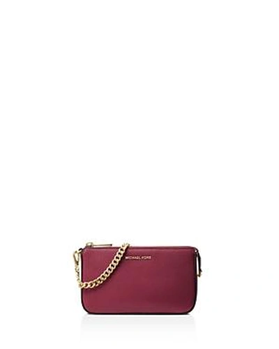 Shop Michael Michael Kors Chain Pouchette Medium Leather Clutch In Mulberry Pink/gold