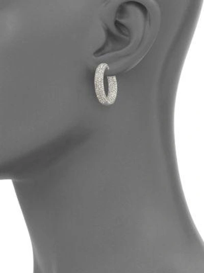 Shop Adriana Orsini Pavé Crystal Rhodium-plated Inside-outside Hoop Earrings In Silver