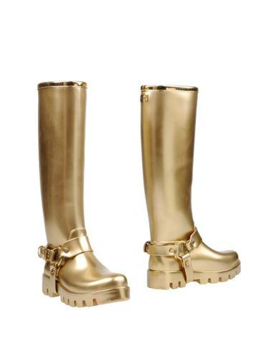 Shop Dolce & Gabbana Biker Boots In Gold