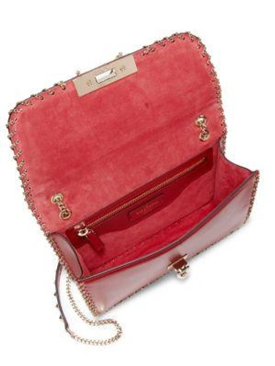 Shop Valentino Demilune Leather Shoulder Bag In Rosso