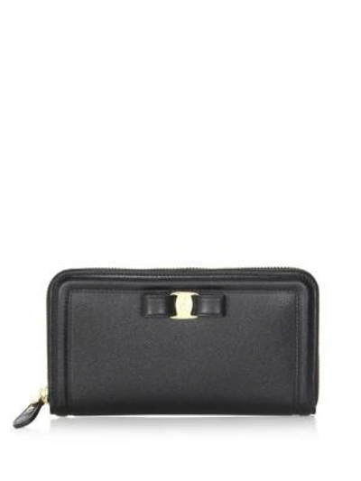 Shop Ferragamo Vara Leather Zip-around Wallet In Black