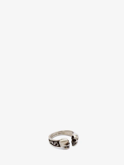 Shop Alexander Mcqueen Twin Skull Ring In Silver