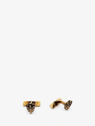 Shop Alexander Mcqueen "queen And King" Skull Cufflinks In Antique Gold