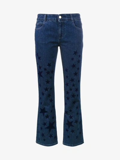 Shop Stella Mccartney Kick Flare Star Printed Jeans In Blue