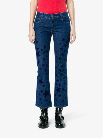 Shop Stella Mccartney Kick Flare Star Printed Jeans In Blue