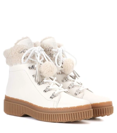 Shop Tod's Leather Ankle Boots In White