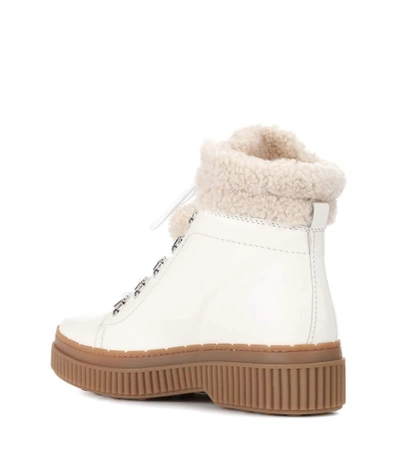 Shop Tod's Leather Ankle Boots In White