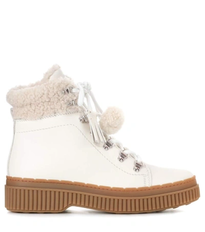 Shop Tod's Leather Ankle Boots In White
