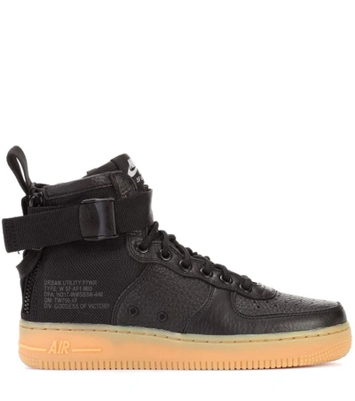 Shop Nike Air Force 1 Mid Sneakers In Black