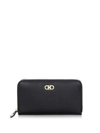 Shop Ferragamo Gancini Leather Zip-around Wallet In Black