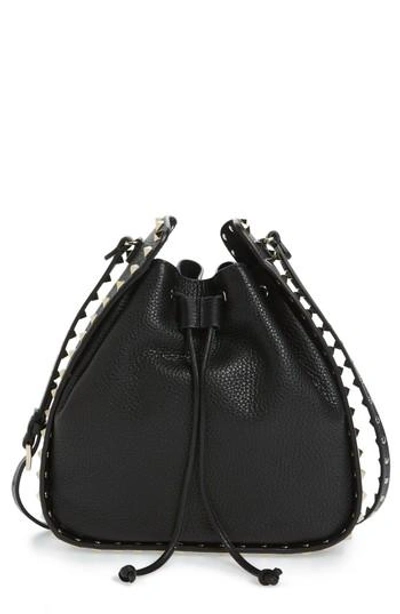 Shop Valentino Large Rockstud Leather Bucket Bag - Black