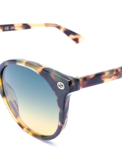 Shop Gucci Eyewear Tortoiseshell Cat-eye Sunglasses - Brown