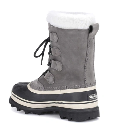 Shop Sorel Caribou® Leather And Rubber Boots In Grey