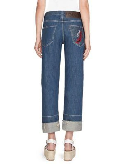 Shop Loewe Embroidered Pocket Jeans In Indigo