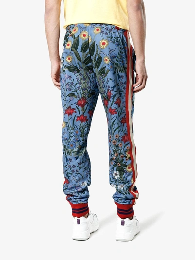 Shop Gucci New Flora Technical Jersey Trousers In Blue