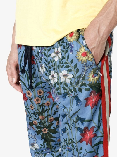 Shop Gucci New Flora Technical Jersey Trousers In Blue